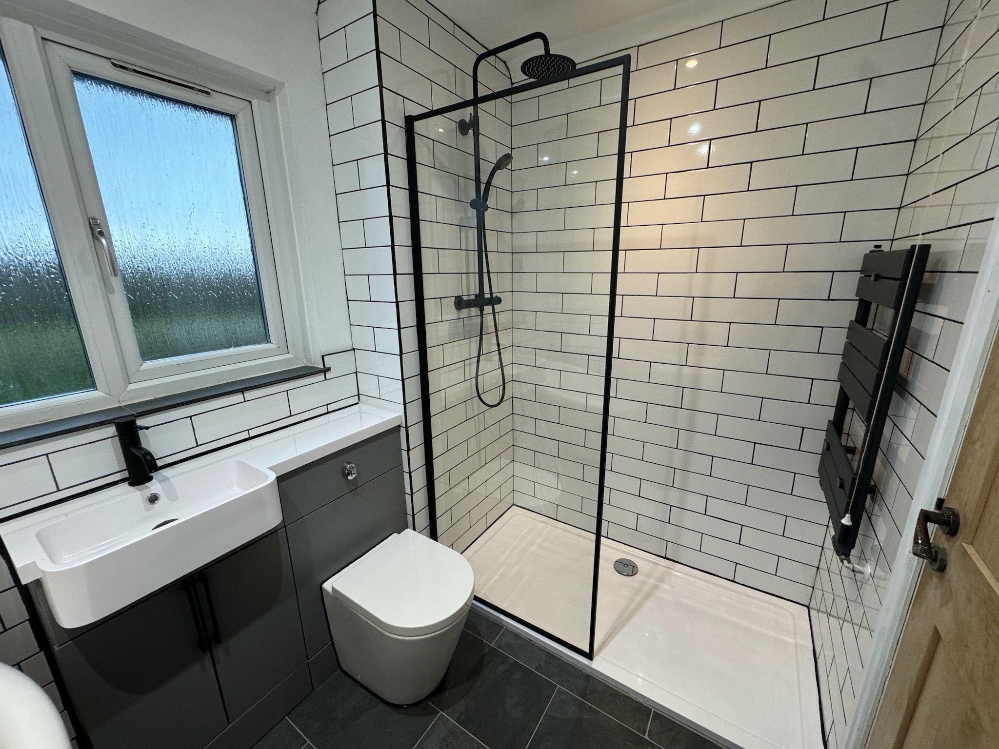 Hughes Plumbing — qualified plumber at work in Pembrokeshire